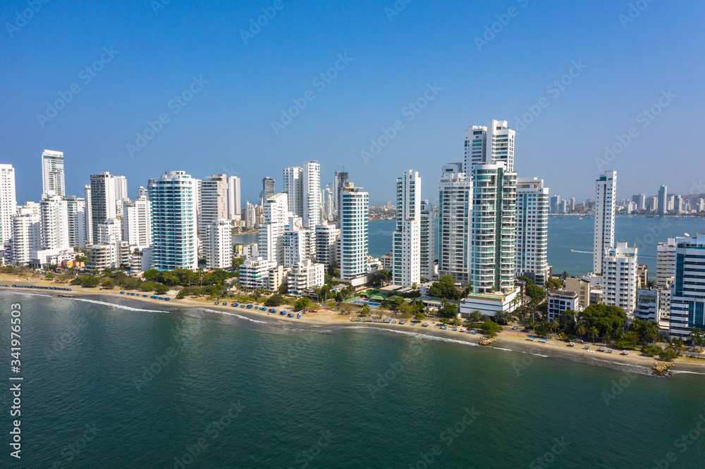 Aerial View of the hotels and tall apartment buildings near the Caribbean coast. Modern City Skyline.