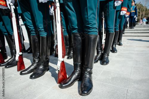 Victory Day in Russia. Officers of the guard of honor in the ranks. Military uniform, close-up on boots
