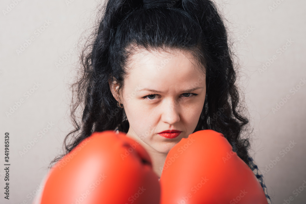 businesswoman with boxing gloves ready for fighting businesswoman with boxing gloves ready for fighting