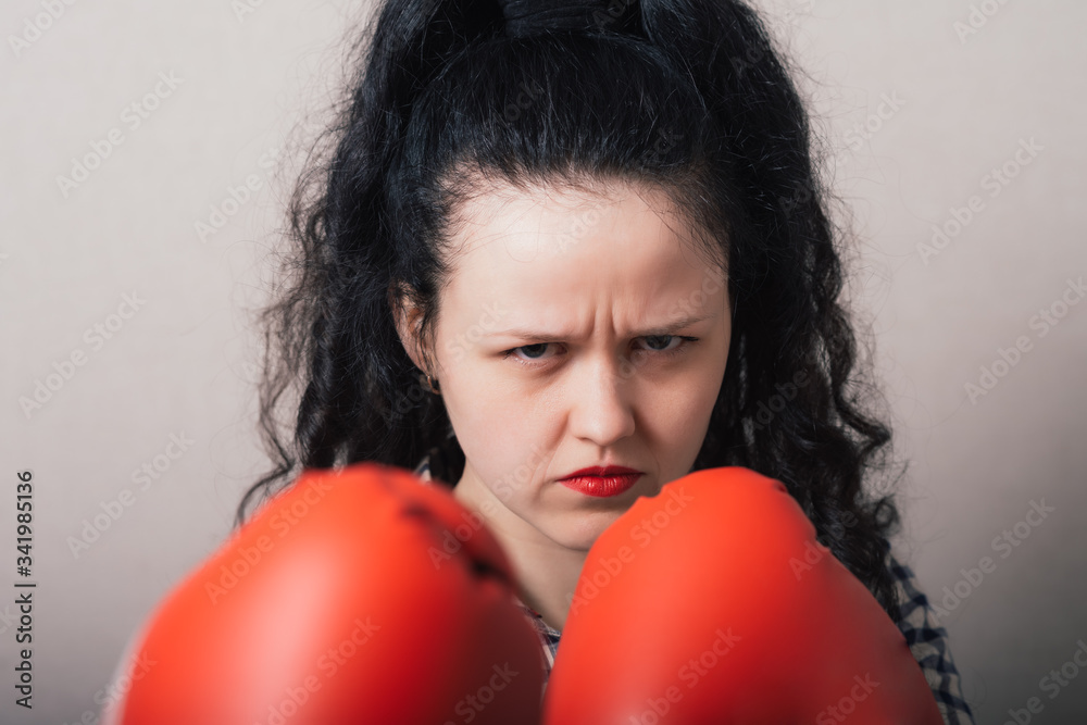businesswoman with boxing gloves ready for fighting businesswoman with boxing gloves ready for fighting