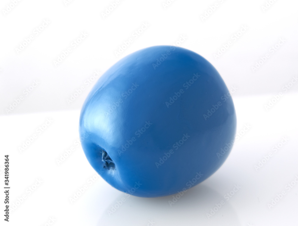 Obraz premium blue apple on a white background