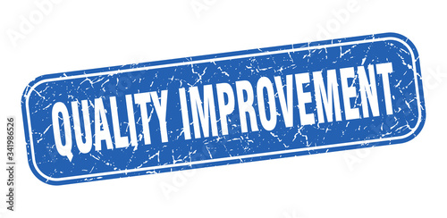 quality improvement stamp. quality improvement square grungy blue sign