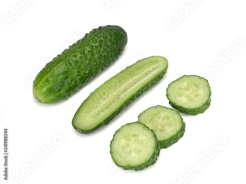 Cucumber and its slices isolated on a white background