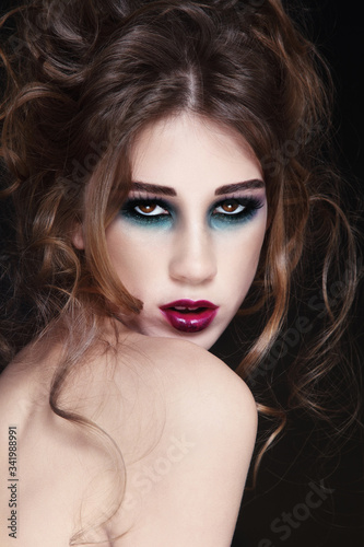 Fototapeta Naklejka Na Ścianę i Meble -  Portrait of young beautiful girl with fancy gothic make-up