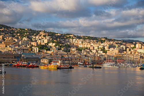 Panoramic view of Genoa and its port seen from the sea.