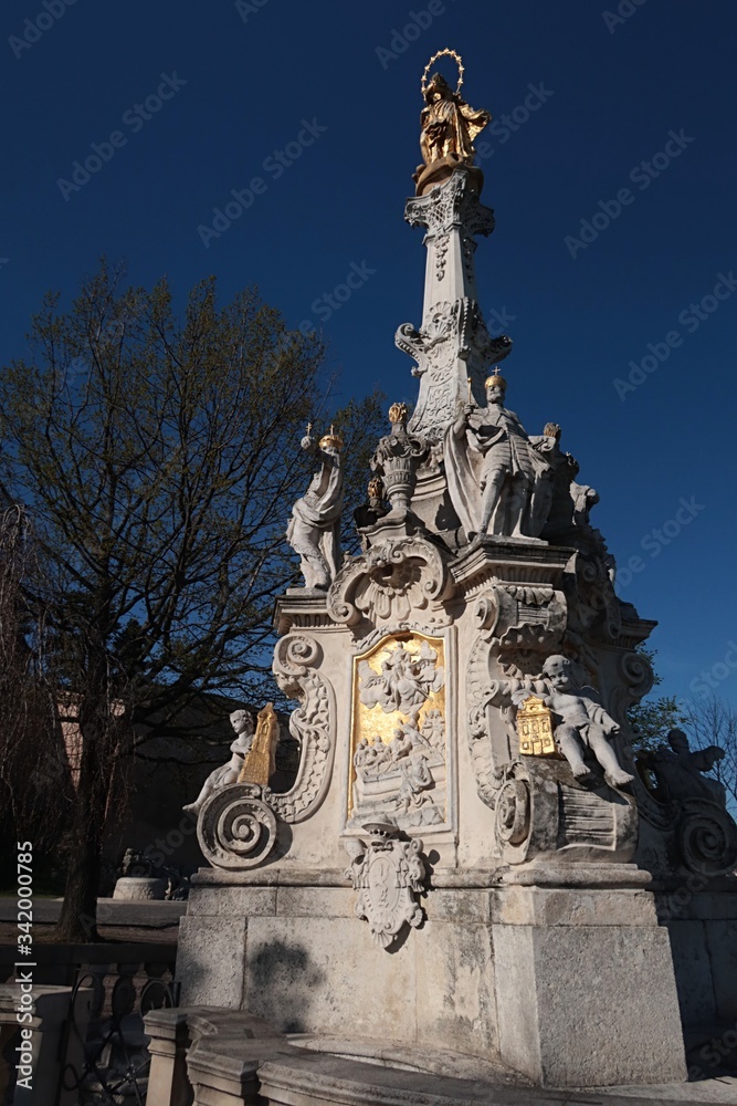 Plagure column with statue of Immaculate, placed in front of Nitra castle, western Slovakia. Flamboyant baroque sculpture is from year 1750 and was built to the plaque epidemic in years 1710 - 1739.