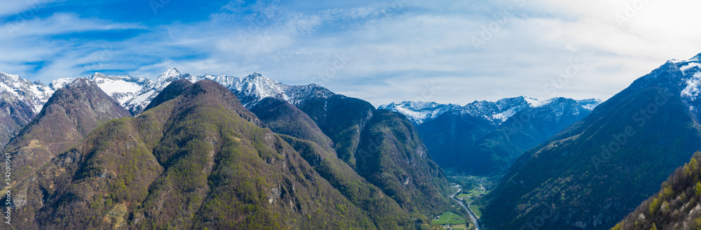 aerial panorama view on upper Maggia valley with snowcapped mountains