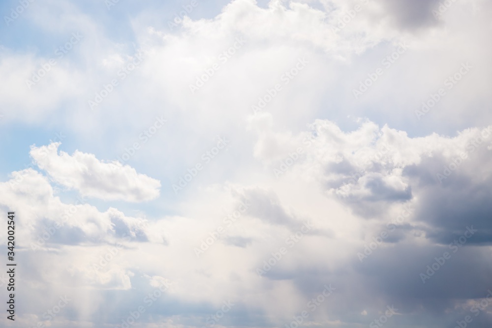 Beautiful light sky with white and gray clouds Beautiful light sky with white and gray clouds