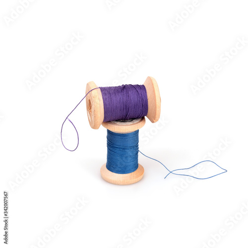 Spool of thread isolated on white background