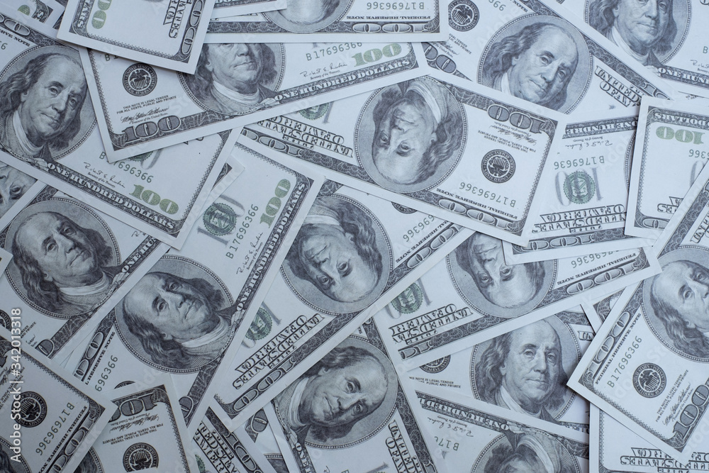 Group of money stack of 100 US dollars banknotes a lot of the background texture top view Group of money stack of 100 US dollars banknotes a lot of the background texture top view
