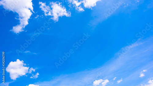 Beautiful blue summer sky with fluffy clouds as a background © Günter Albers