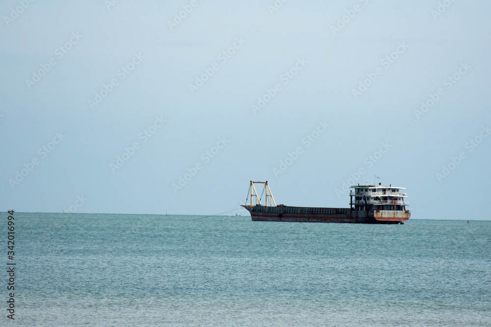 Logistic ship floating on sea and ocean at Samila Beach in Hat Yai City of Songkhla, Thailand