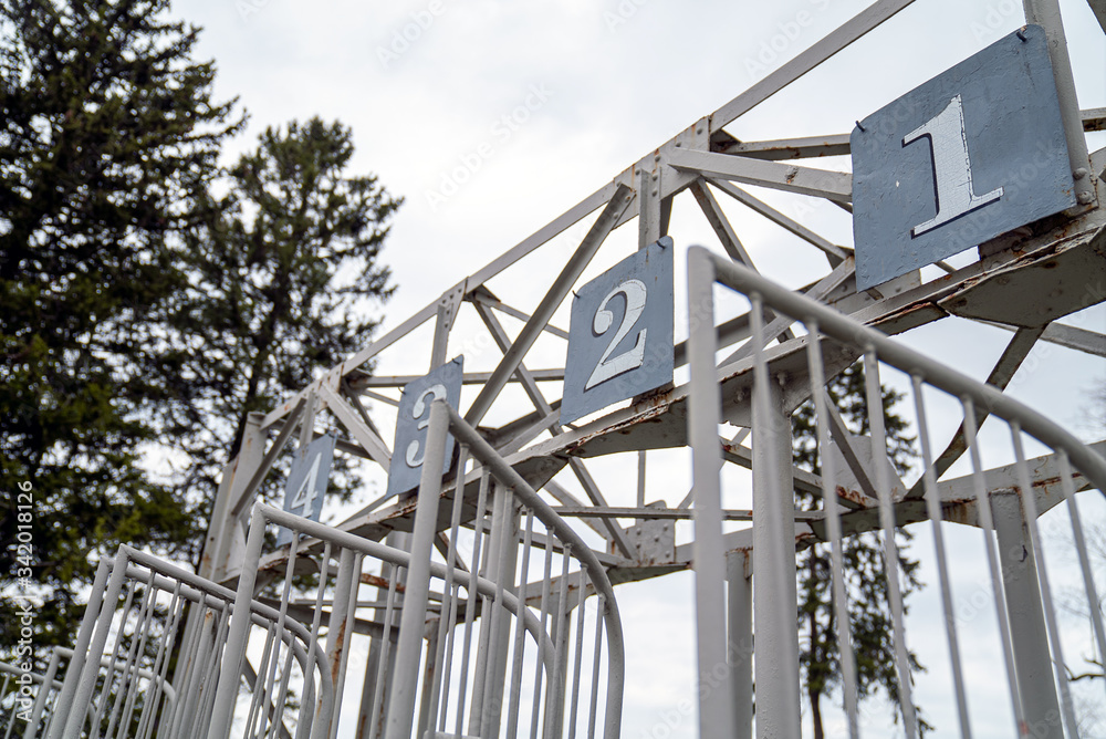 Fototapeta premium Old Abandoned Horse Track Gate Close Up