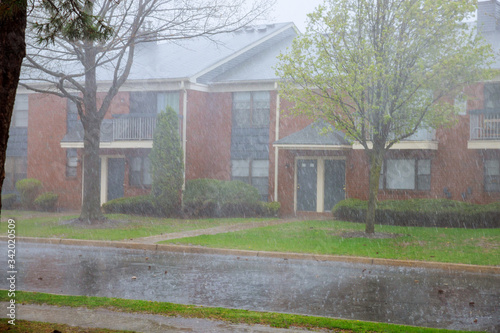 Фотография Apartment building during strong winds and heavy rainfall