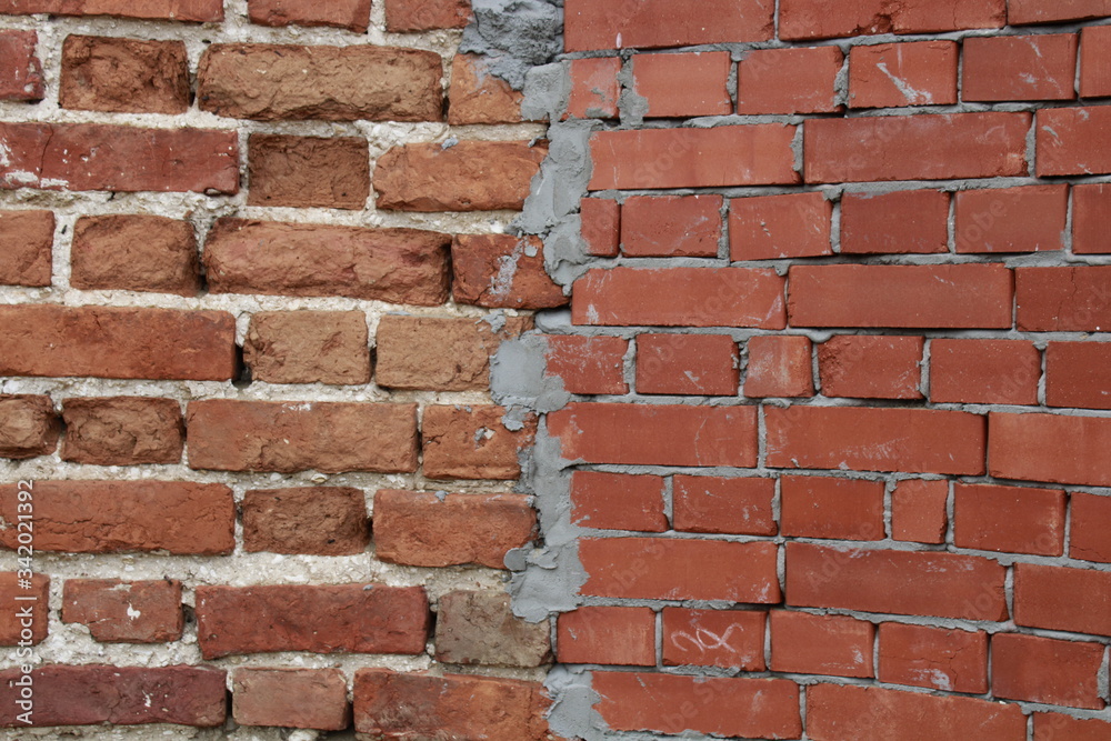 Obraz premium old and new brick wall