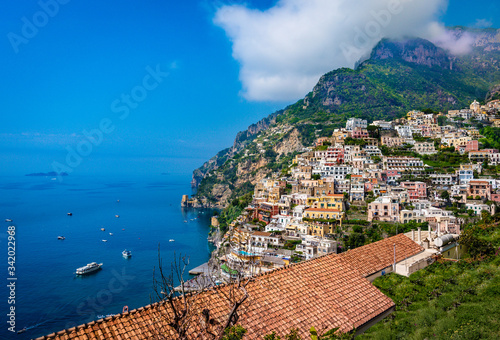 Panoramic view of beach and colorful buildings  in Positano town  at  Amalfi Coast  Italy.