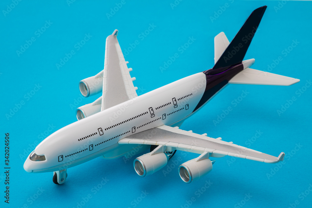 Airplane isolated on blue background