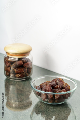 Dates fruit on white background. Medjool dried date palm fruits photo