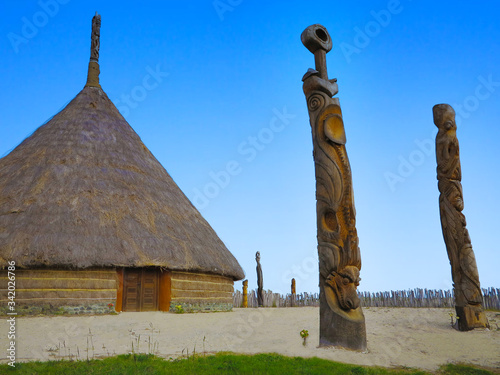 Wallpaper Mural Typical Kanak house in New Caledonia with sculptures from the life of the local people. Torontodigital.ca