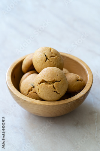 Healthy Organic Freshly Baked Homemade Peanut Butter Cookies in Wooden Bowl.