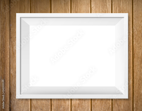 White frame on wooden wall background, mockup photo