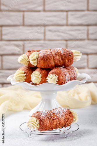 Austrian pastry schaumrollen on a white table photo