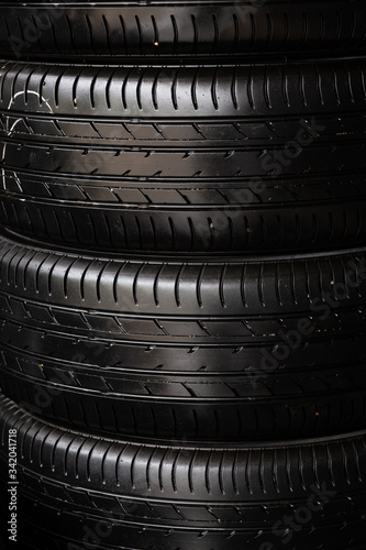 Satck of car tires texrture background  in automobile store photo