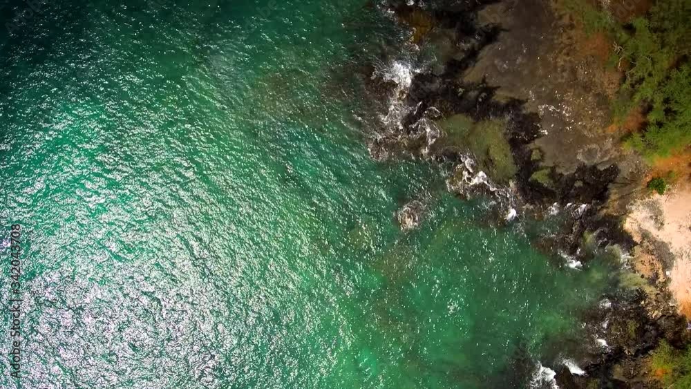 Flying drone rotating above the ocean Flying drone rotating above the ocean