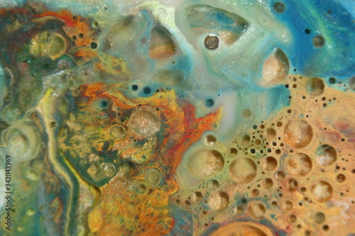 Abstract liquid ink marble color waves and bubbles