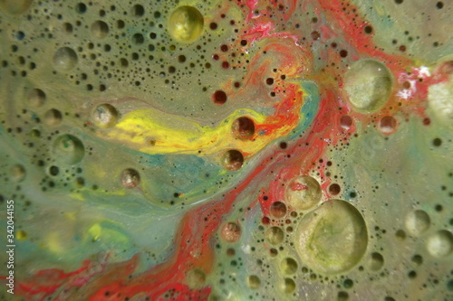 Abstract liquid ink marble color waves and bubbles