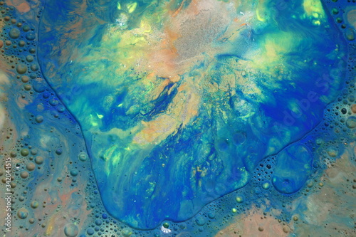 Abstract liquid ink marble color waves and bubbles