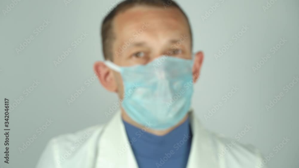 Medical lab worker with protective gloves holding test blood samples at the hospital, Doctor holding a test tube with a positive coronavirus test blood sample. New Coronavirus (2019-ncoV) Medical lab worker with protective gloves holding test blood samples at the hospital, Doctor holding a test tube with a positive coronavirus test blood sample. New Coronavirus (2019-ncoV)
