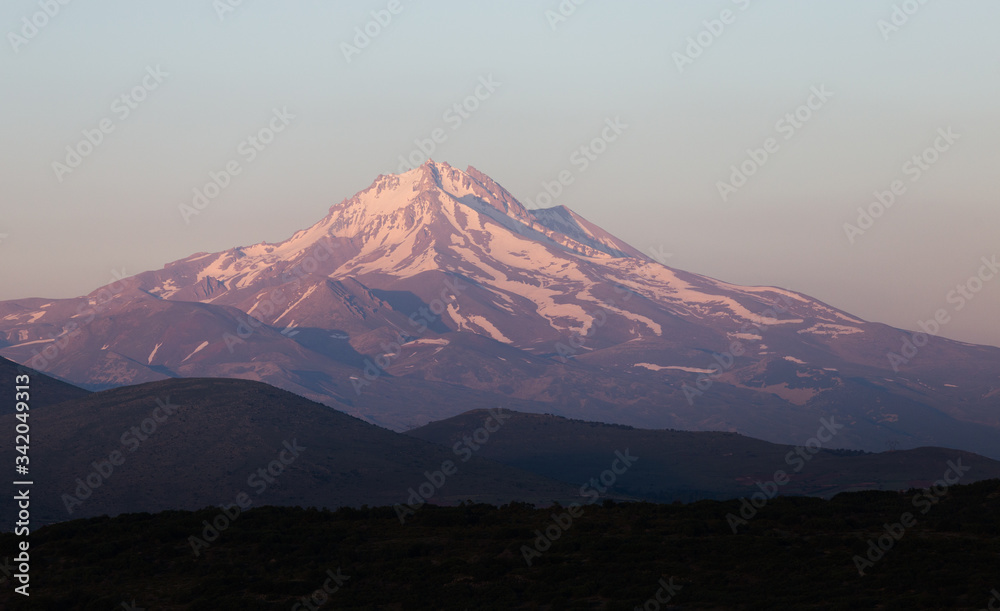 View of the Mount Erciyes in Kayseri. Dark shapes in sunset