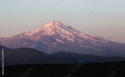 View of the Mount Erciyes in Kayseri. Dark shapes in sunset © Viktoria