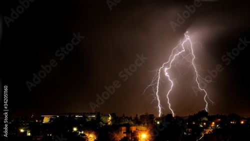 Lightning strikes at night during a severe thunderstorm over the city of Mendoza, Argentina