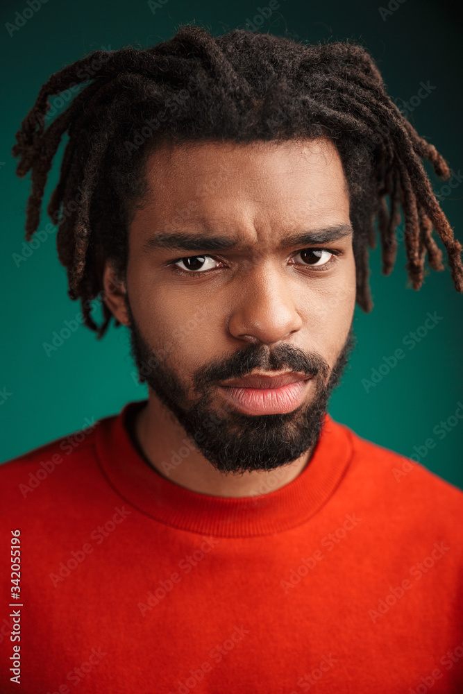 Portrait of a young african man wearing pullover