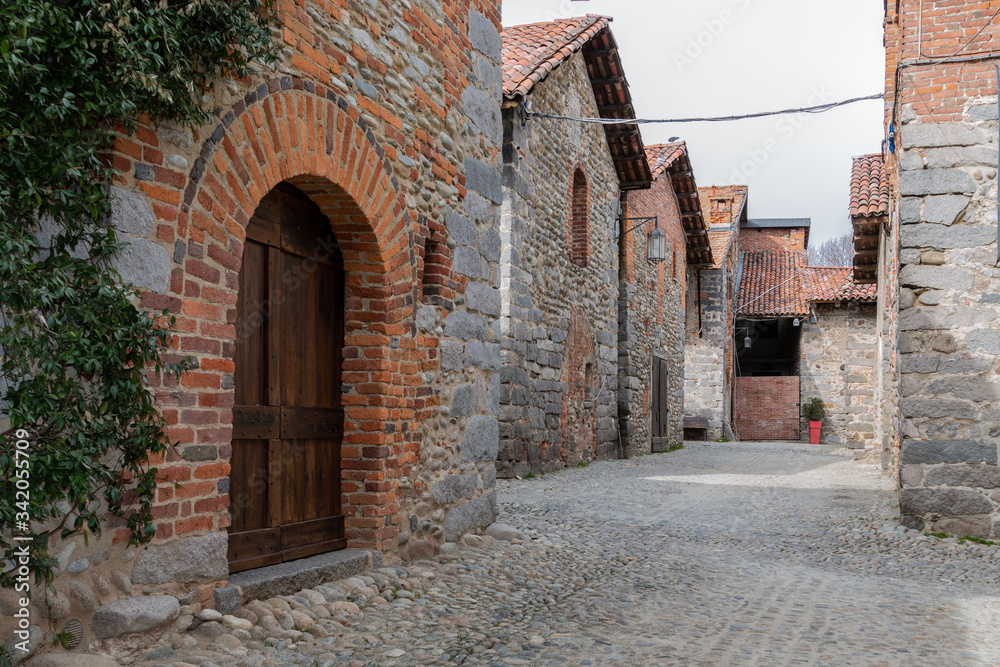 In the medieval village of Candelo. Known as Ricetto di Candelo (Shelter of Candelo), aged of 14th century.