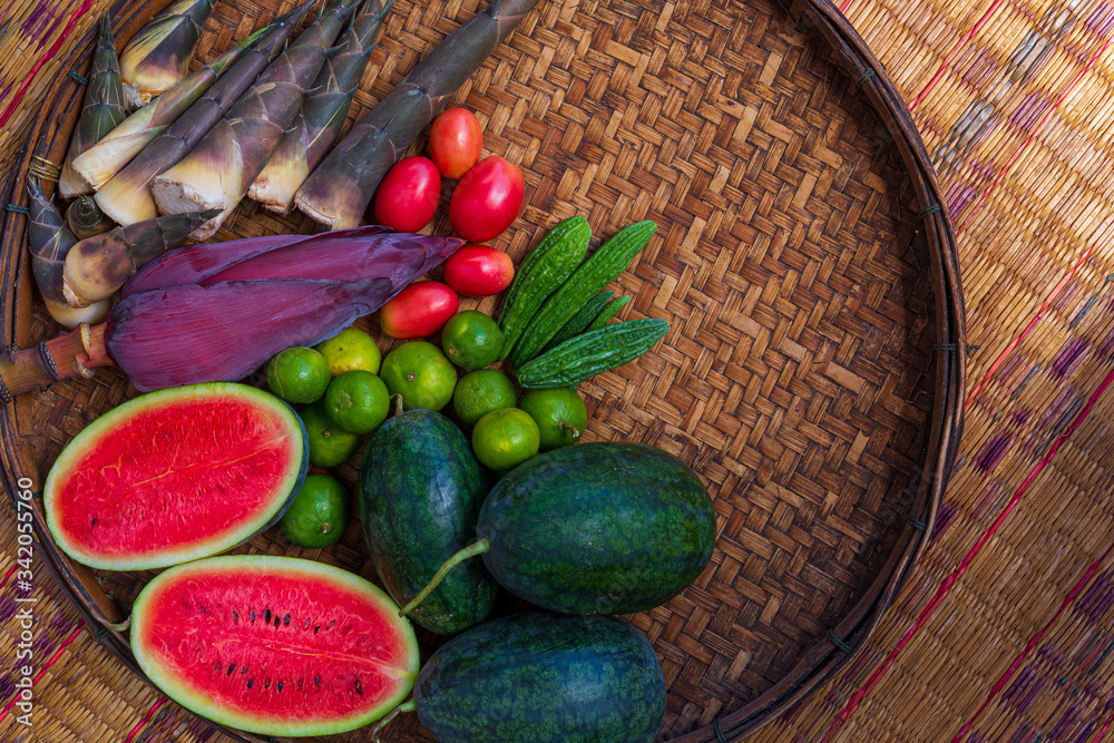 Group of Asian or Tropical fruit in basket, Thailand Group of Asian or Tropical fruit in basket, Thailand