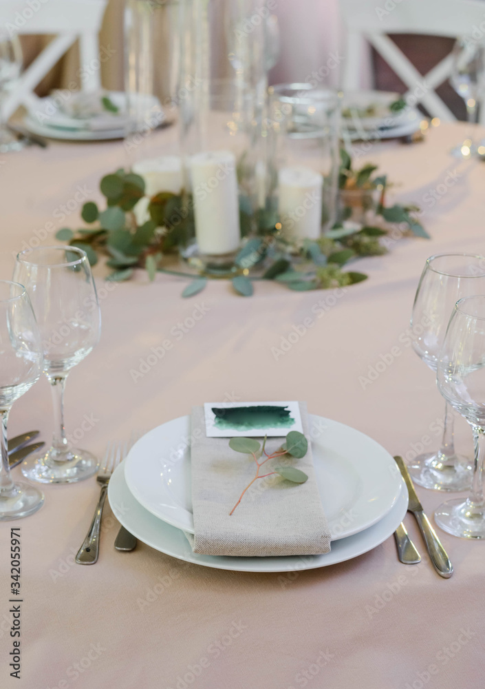 Table setting for party or wedding reception in bright ????, a decoration concept for weddings or social events Table setting for party or wedding reception in bright ????, a decoration concept for weddings or social events