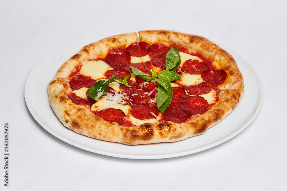 A slice of pepperoni pizza on a plate