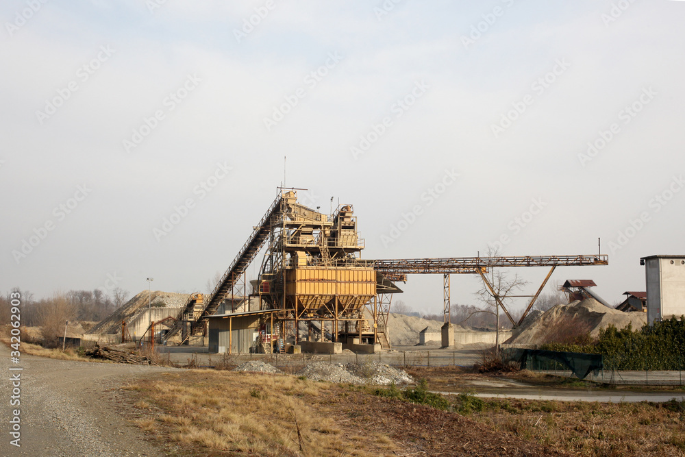 sand and gravel quarry with a conveyor belt with copy space for your text