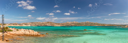 Fototapeta Naklejka Na Ścianę i Meble -  Panoramic view of the sunny beaches, and of the clear and transparent waters of the Maddalena island in Sardinia, Italy.