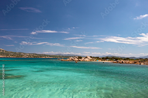 Panoramic view of the sunny beaches, and of the clear and transparent waters of the Maddalena island in Sardinia, Italy.