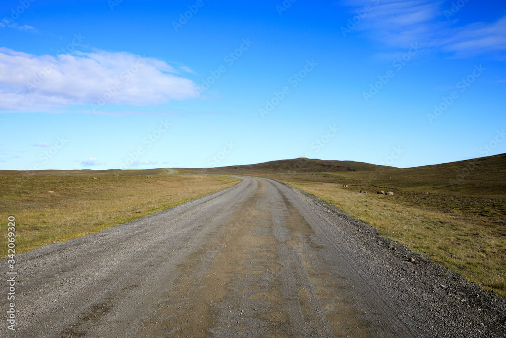 Kjolur / Iceland - August 25, 2017: The gravel road named Kjolur Highland Road, Iceland, Europe Kjolur / Iceland - August 25, 2017: The gravel road named Kjolur Highland Road, Iceland, Europe