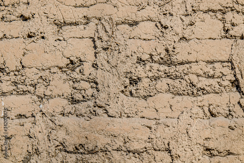 Clay wall collapses as an abstract background