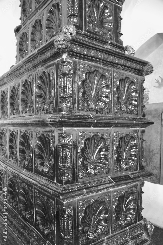 Fototapeta premium Metallic forged furnace. Interior elements. Close-up. Metal construction. Victorian style. Black and white image