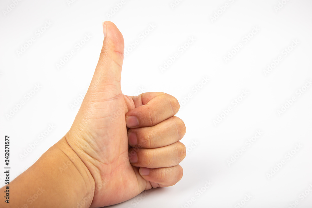 thumb up sign, Close up Man Hand on Thumb up good sign isolated on white background.