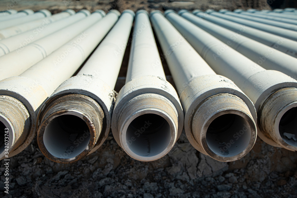 Fototapeta premium Geology. Drilling rig. Drilling deep wells. Drilling equipment and tools. Mineral exploration. The device of wells for freezing soil.