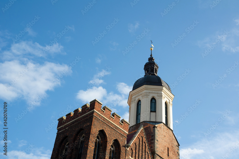 Cathedral of the Assumption of the Virgin Mary, Opava, Silesia, Czech  Republic / Czechia, Europe - beautiful gothic religious building with tower  made in baroque style. Bottom view and low angle. Stock