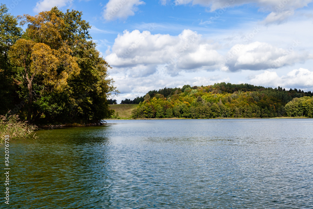 Hancza lake view from the middle of water. Sunny day weather, calm, peaceful landscape view. Blaskowizna, Poland, Europe. Hancza lake view from the middle of water. Sunny day weather, calm, peaceful landscape view. Blaskowizna, Poland, Europe.